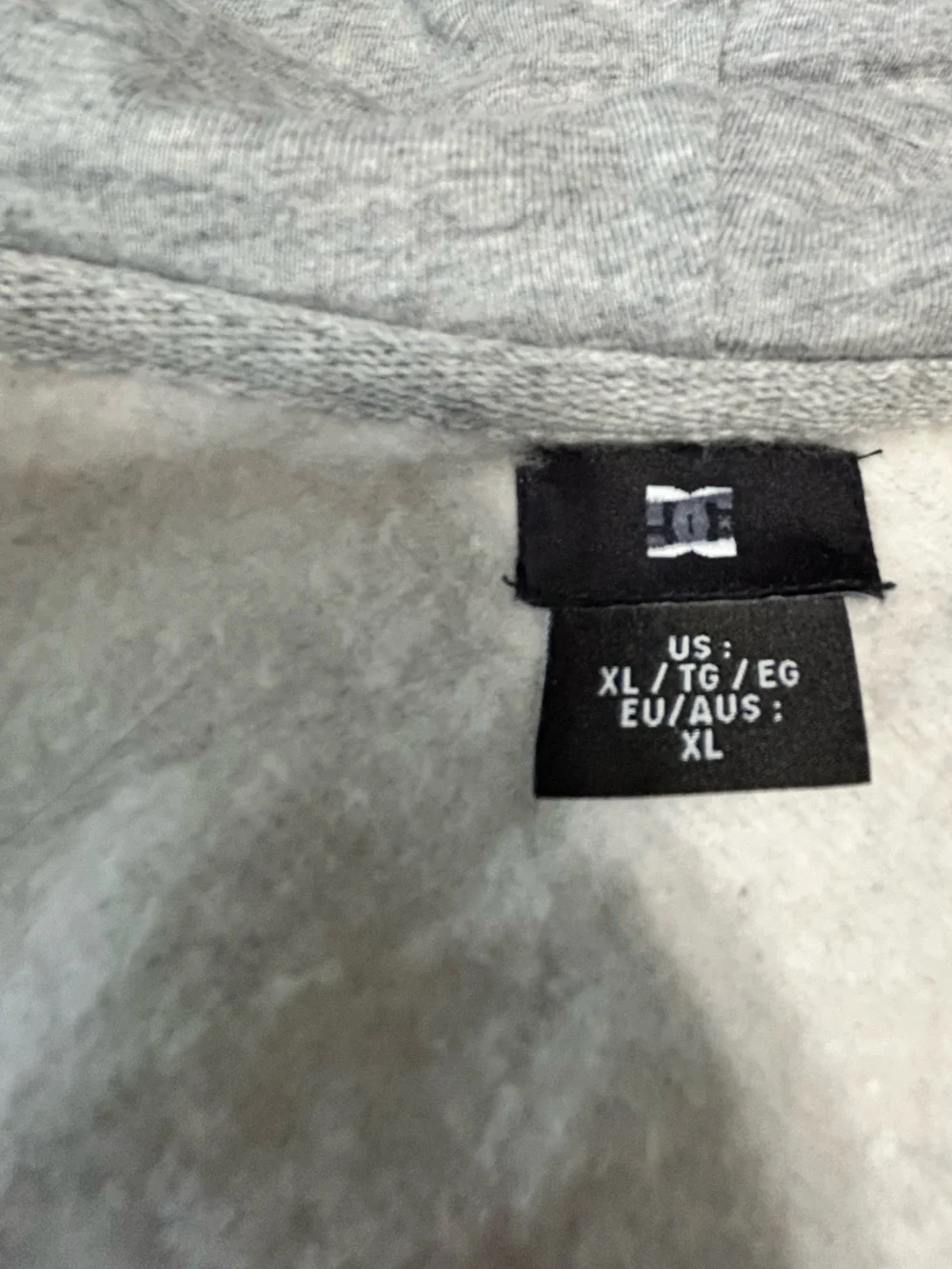 DC Men’s Light Gray Zip-Up Hoodie with Black Logo